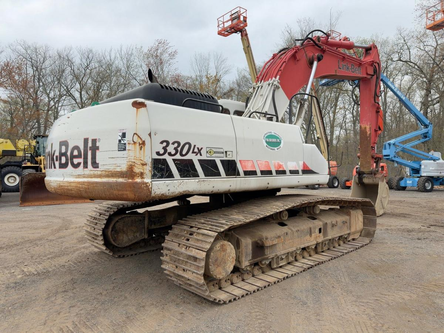 Link-Belt 330 LX excavator in-service showing hydraulic arm and tracked chassis.