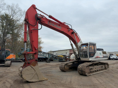Link-Belt 330LX excavator shown in side profile with red boom and bucket on tracked undercarriage.