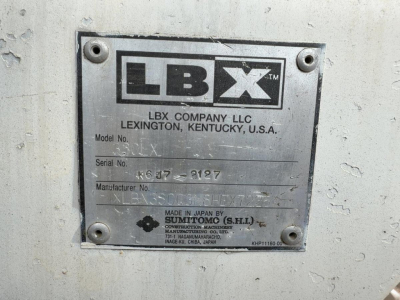 Label plate on Link-Belt equipment showing LBX company plate with model and serial numbers.