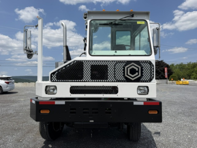 Cable-operated Capacity Sabre DOT yard truck front view showing grille, headlights, and cabin with large windshield and mirrors.