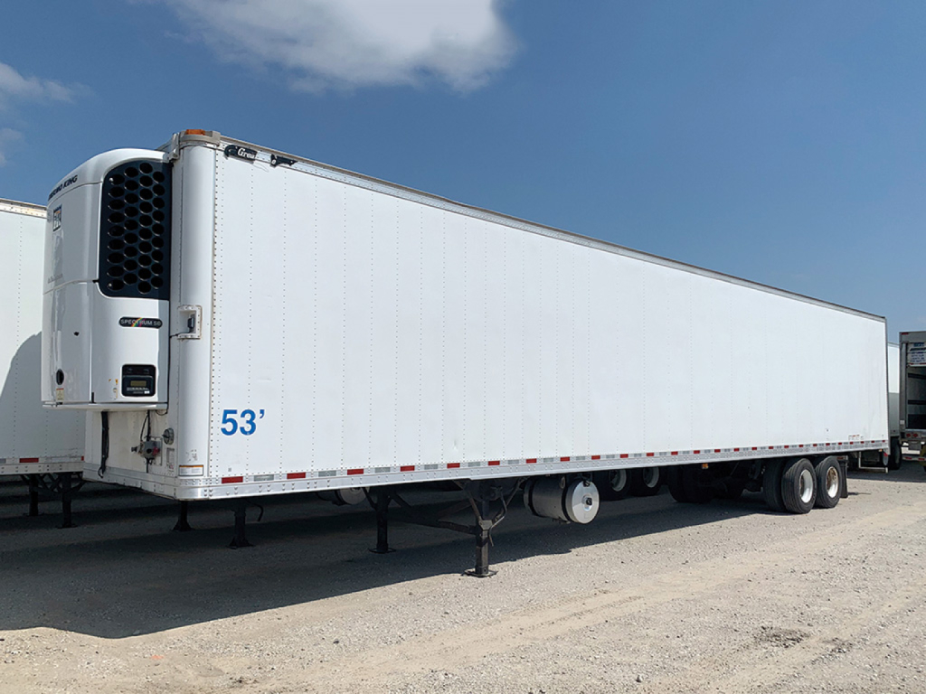 Great Dane multi-temp refrigerated trailer showing 53' length, white exterior with blue 53' marking, refrigeration unit at front left, trailer legs down.