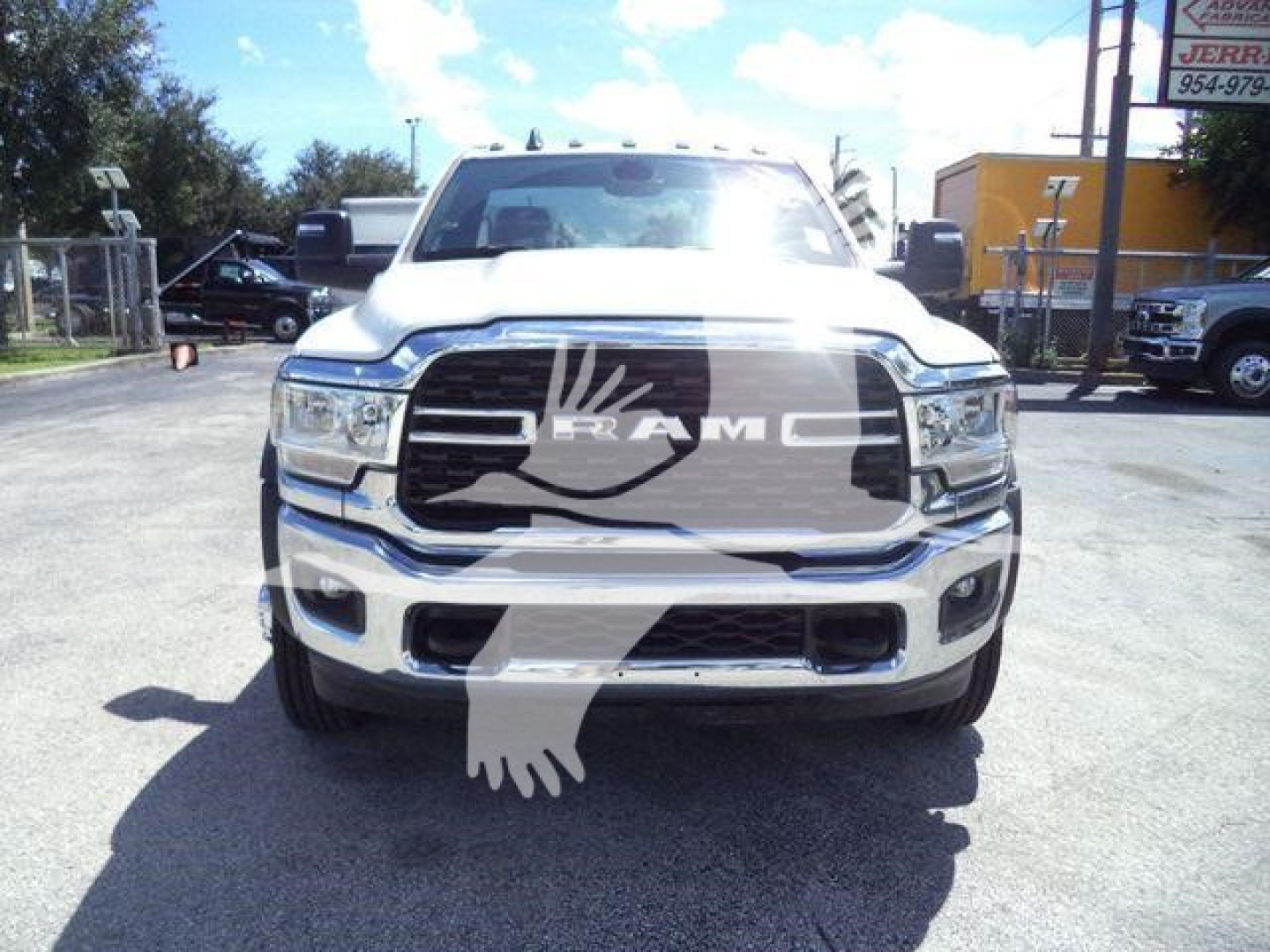 Ram 5500 front view showing chrome grille and headlights, with RAM badge on grille.