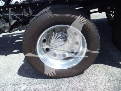 Ram 5500 rollback truck wheel and tire showing steel rim and tire sidewall with tread.