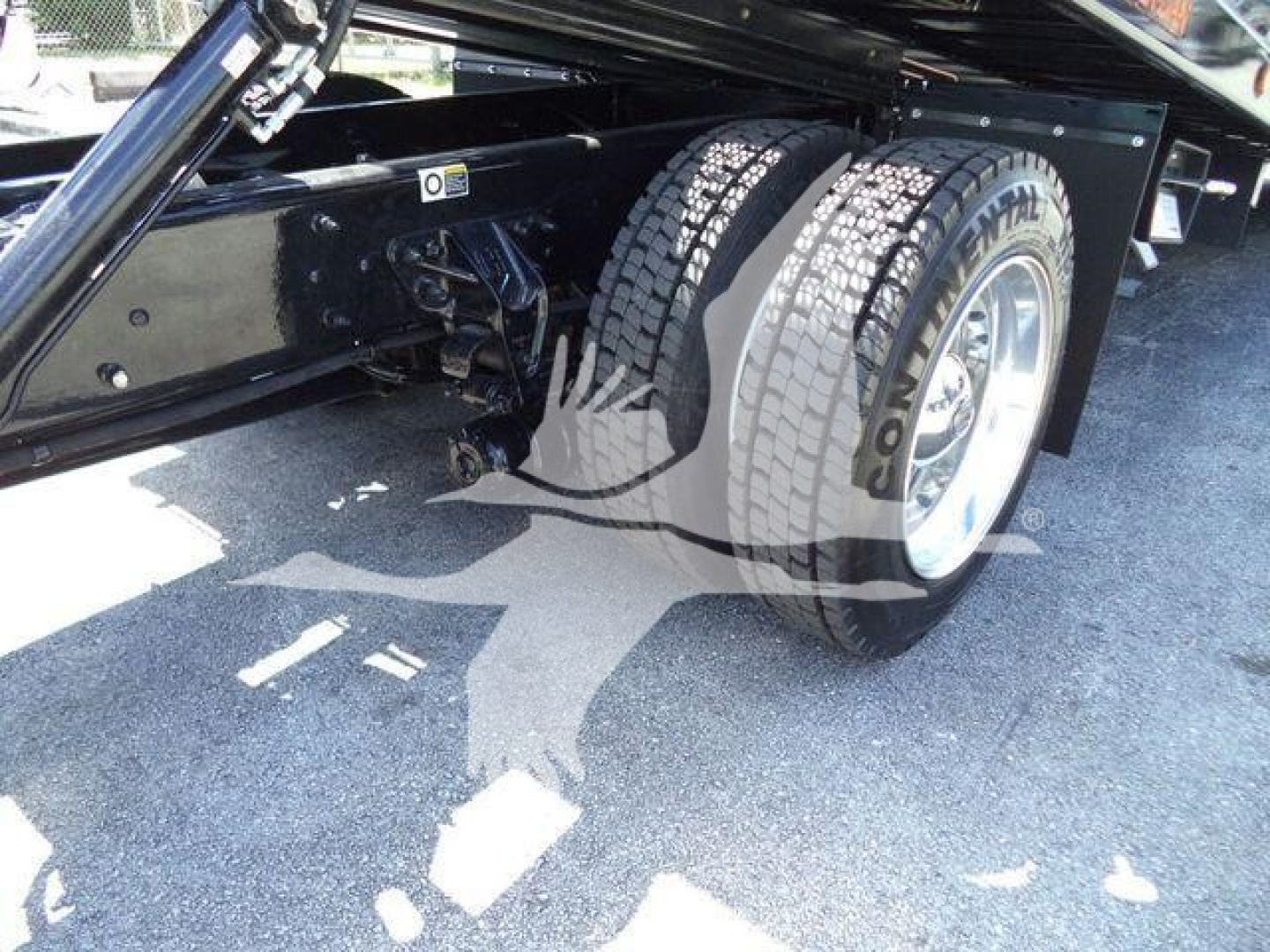 Kenworth T280 rollback truck dual rear wheels and undercarriage view showing wheels and frame.