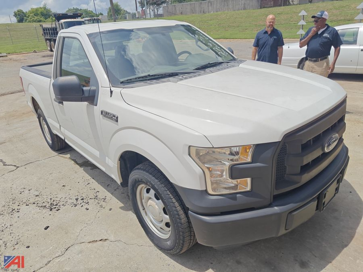 Ford F-150 pickup truck 2016 2WD single cab front-left view with white paint and black grille