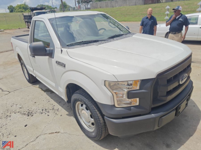 Ford F-150 pickup truck 2016 2WD single cab front-left view with white paint and black grille