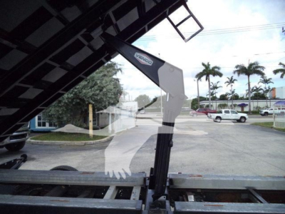 Dump truck bed showing hydraulic lifting mechanism and scissor hoist in profile, Ford E450 chassis, VIN 1FDXE4FS1BDA83803, stock T83803, used condition.