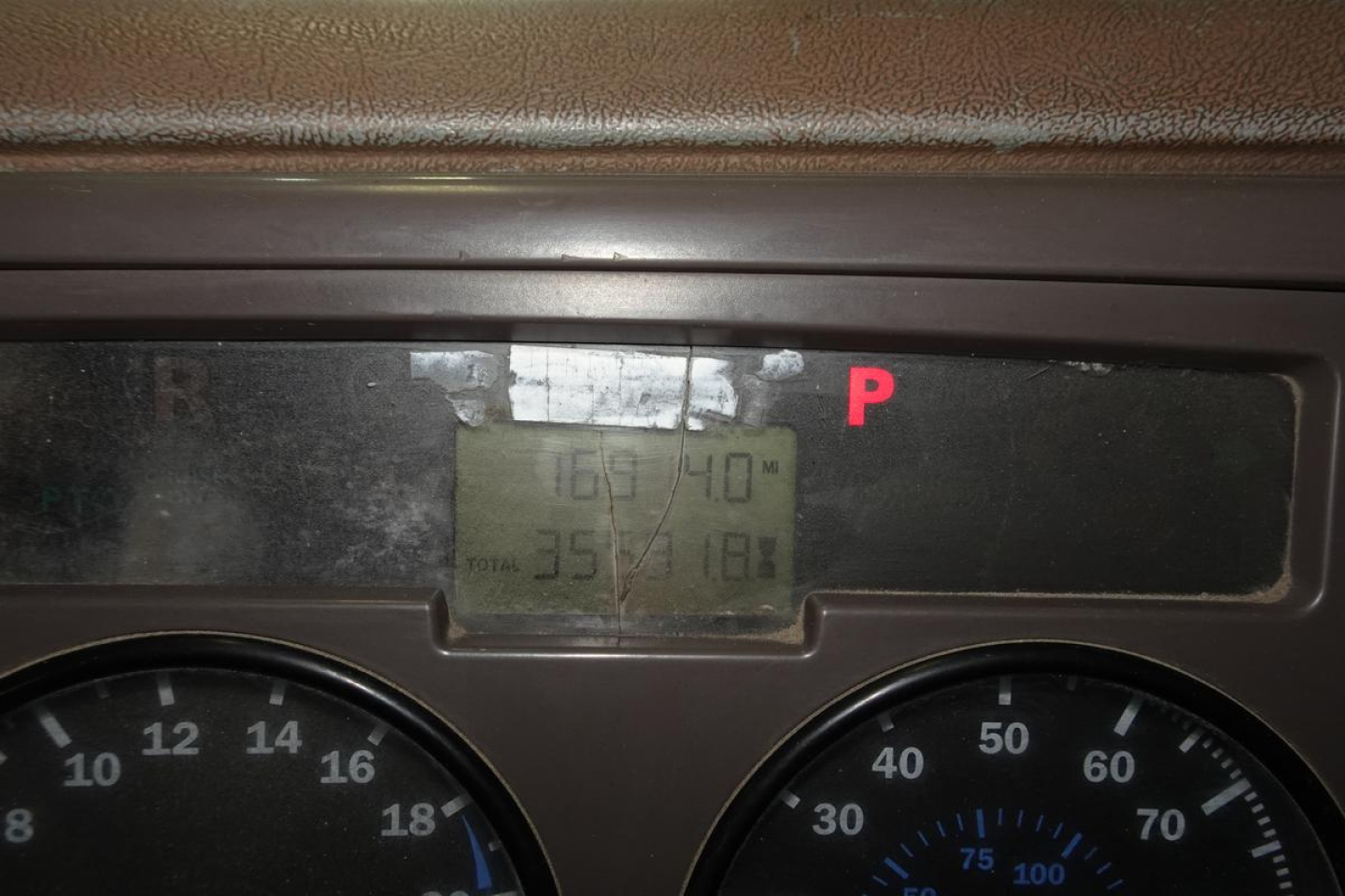 Mack CV Granite CV713 dashboard cluster showing digital readout and gauges.
