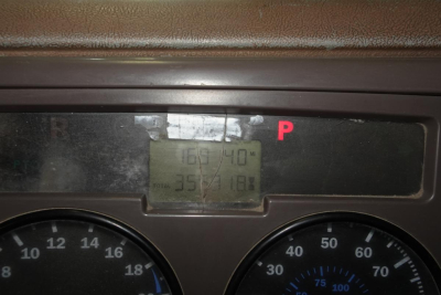 Mack CV Granite CV713 dashboard cluster showing digital readout and gauges.