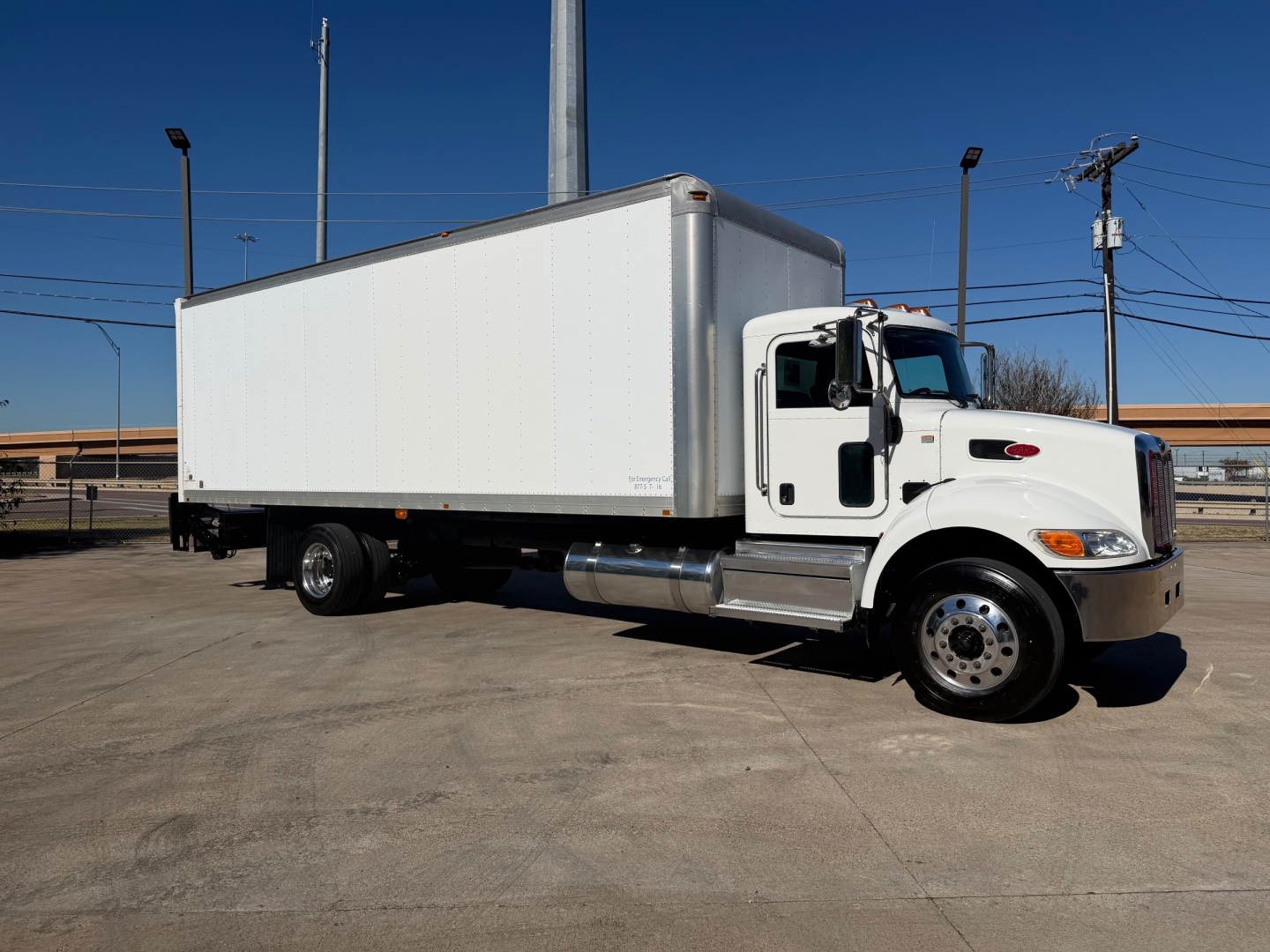 Peterbilt 337 box truck in service showing side profile and cargo box