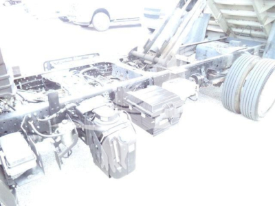 Isuzu NPR XD chassis with truck components showing fuel/wl tanks and wiring harnesses