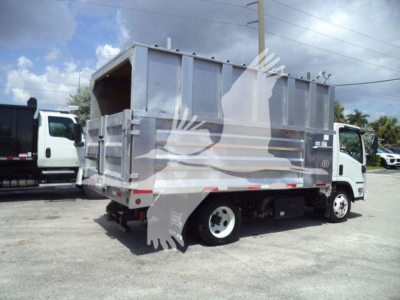 Isuzu NPR XD dump truck in-service showing cargo bed and side view