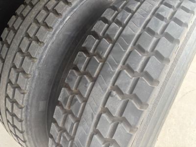 Tires on a refrigerated truck given in the listing for a 2021 International MV607.