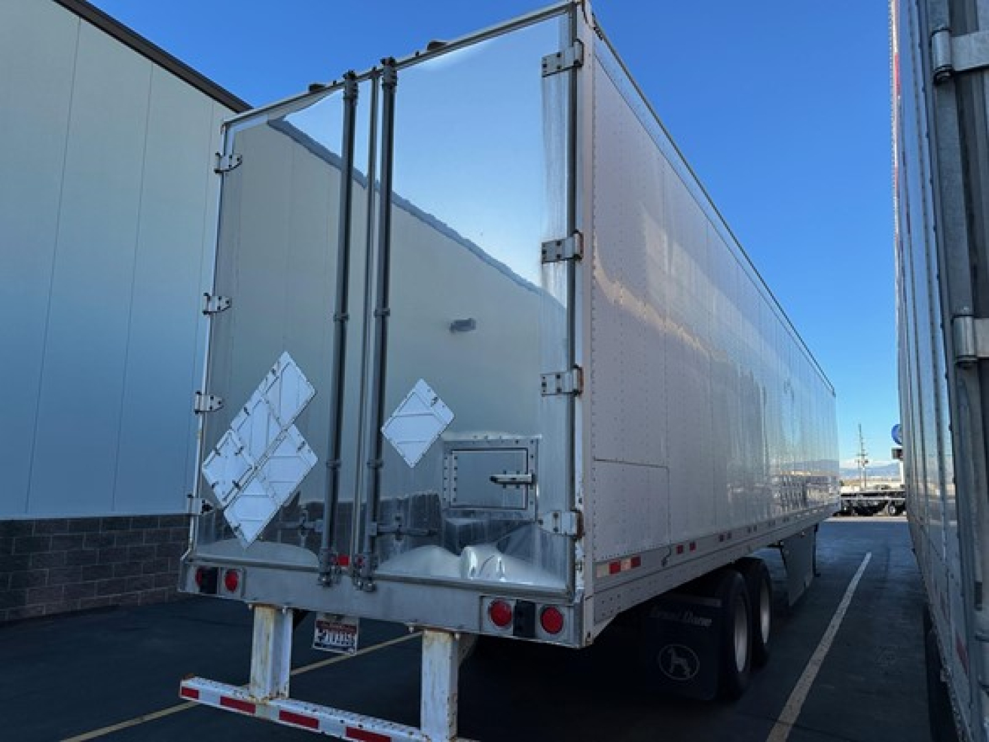 Great Dane Champion trailer back view showing two rear doors and aluminum cargo trailer with diamond reflectors
