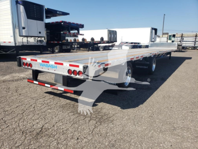 Wabash combo low pro 17.5 trailer rear view showingSafety lights and metal deck with white and blue WABASH branding.