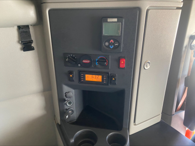 Peterbilt 579 cab interior controls panel with digital display and switches