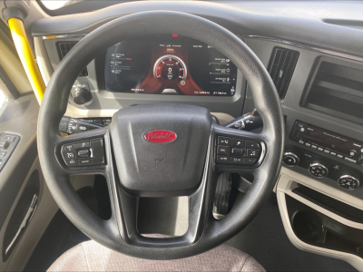 Peterbilt 579 truck interior steering wheel and dashboard with digital display and control buttons