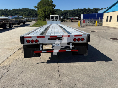 Truck trailer bed showing aluminum deck with LED taillights and rear bumper, 2020 Transcraft D-Eagle II.
