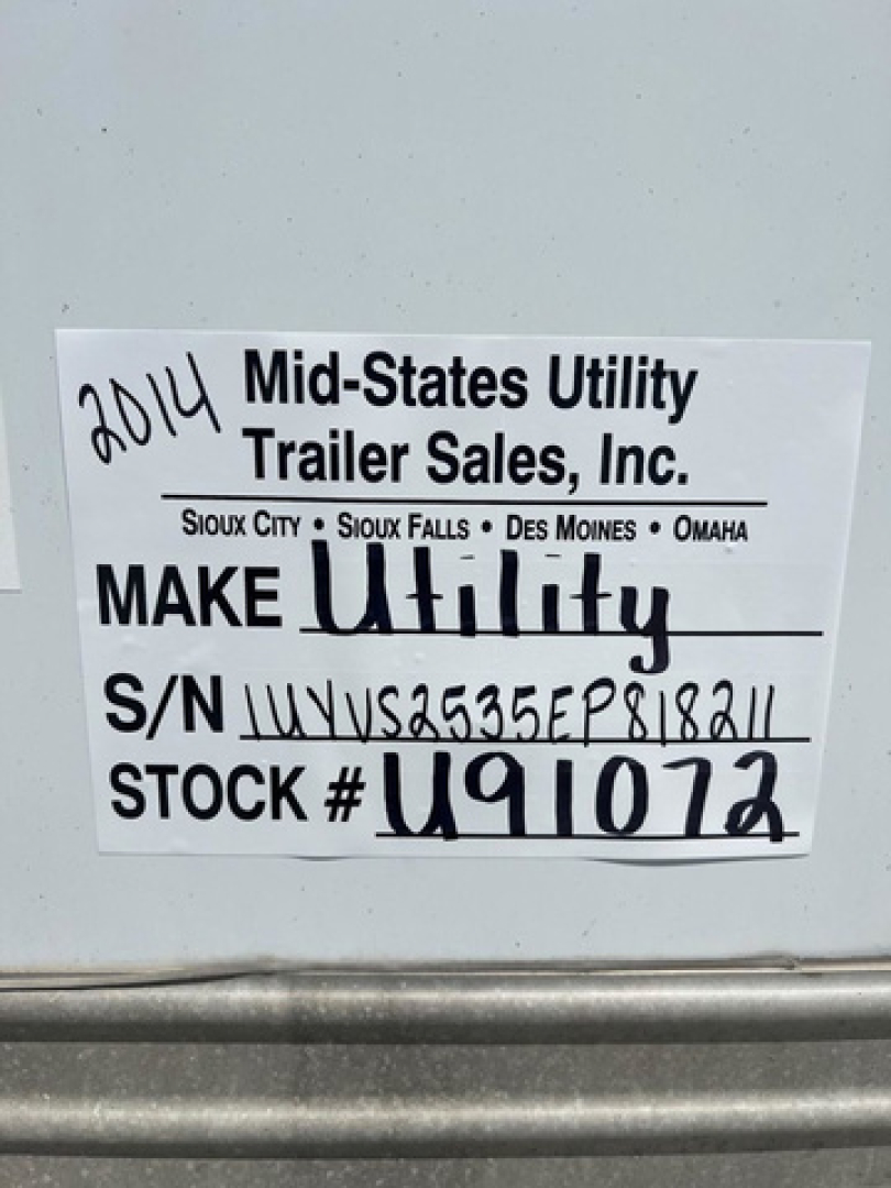 Sticker on a trailer showing 2014 Mid-States Utility Trailer Sales, Inc. Make Utility, S/N UYVS2535EP818211, STOCK # U91072, VIN 1UYVS2535EP818211.