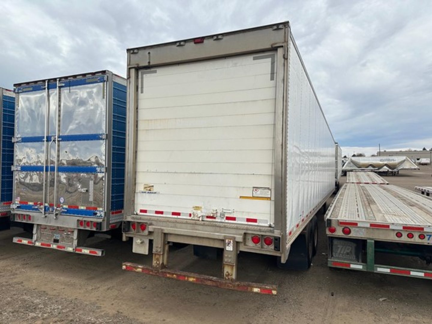 Trailer rear view showing closed roll-up doors on a 2014 Great Dane multi-temperature reefer trailer.