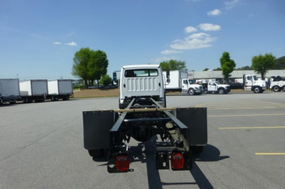 Freightliner Business Class M2 106 Plus cab and chassis rear view showing frame and tail lights.