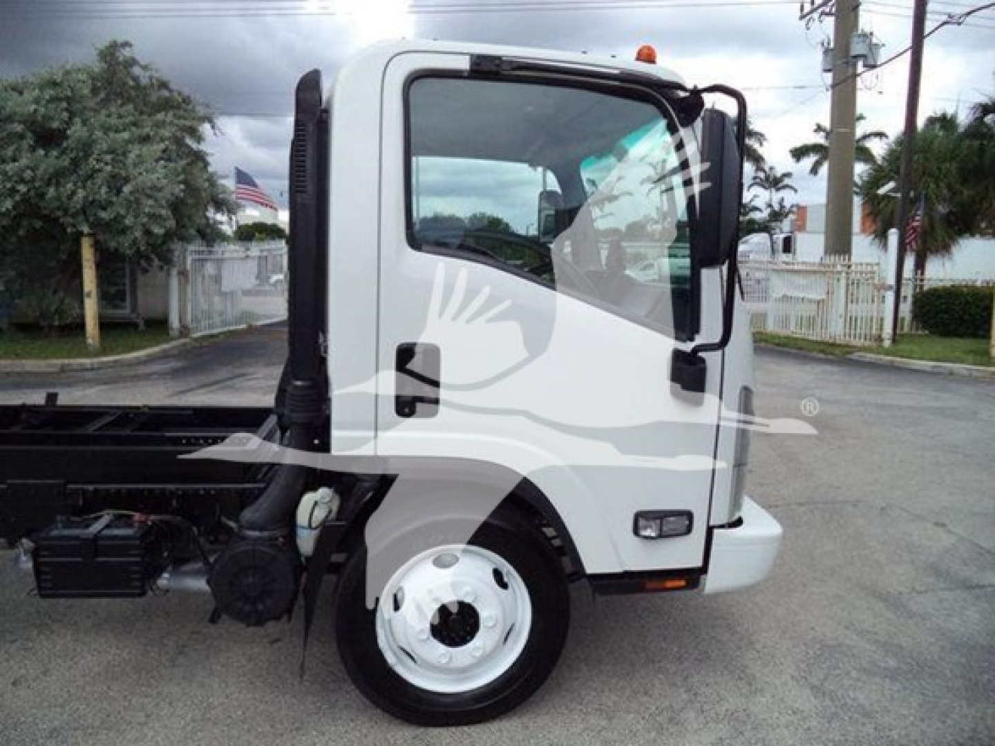 2017 Chevrolet W4500 cab front view showing side door with window, wheel, and exterior components.
