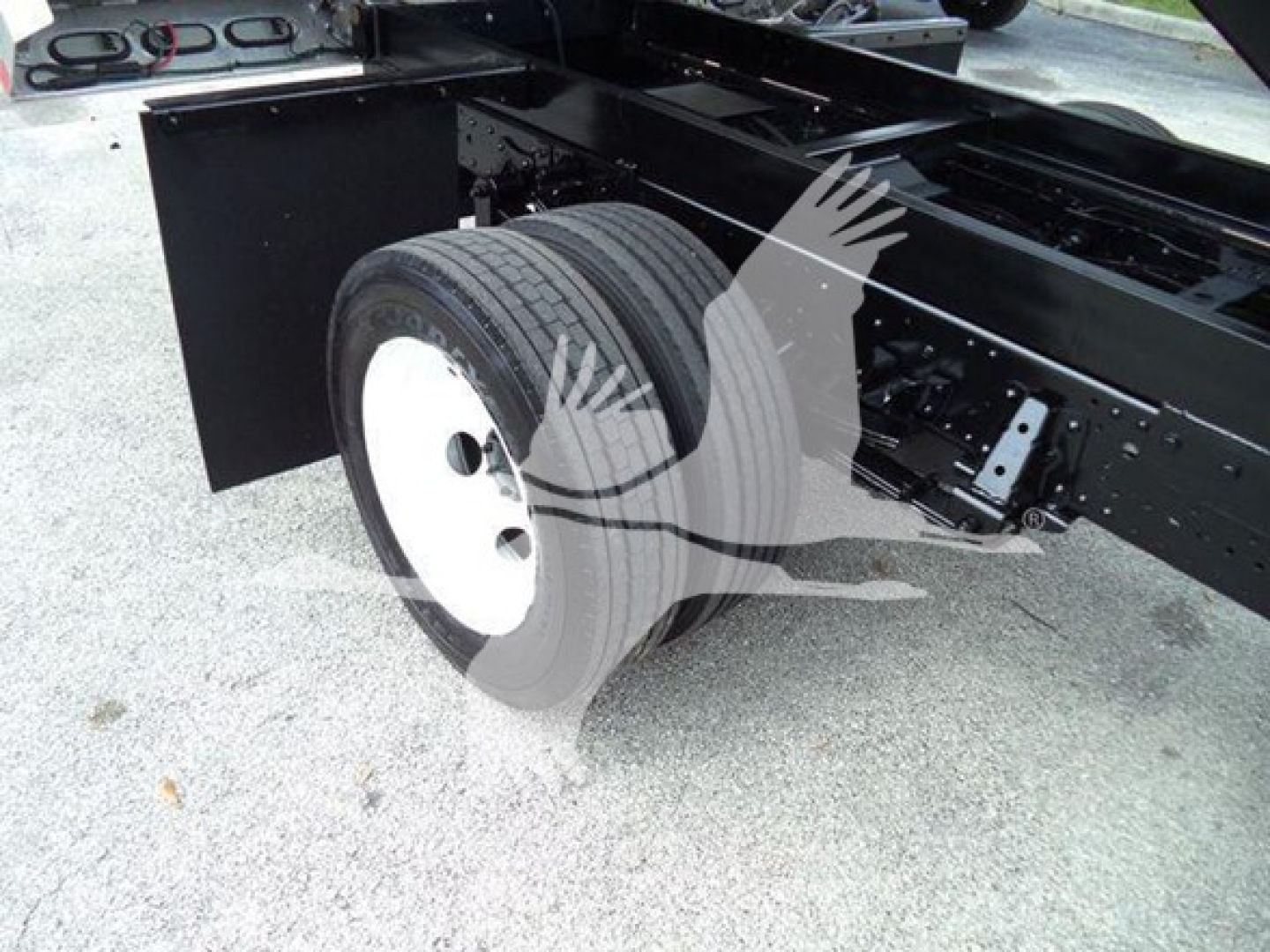 Chevrolet W4500 chassis showing rear dual wheels and frame with wheel and tire details.