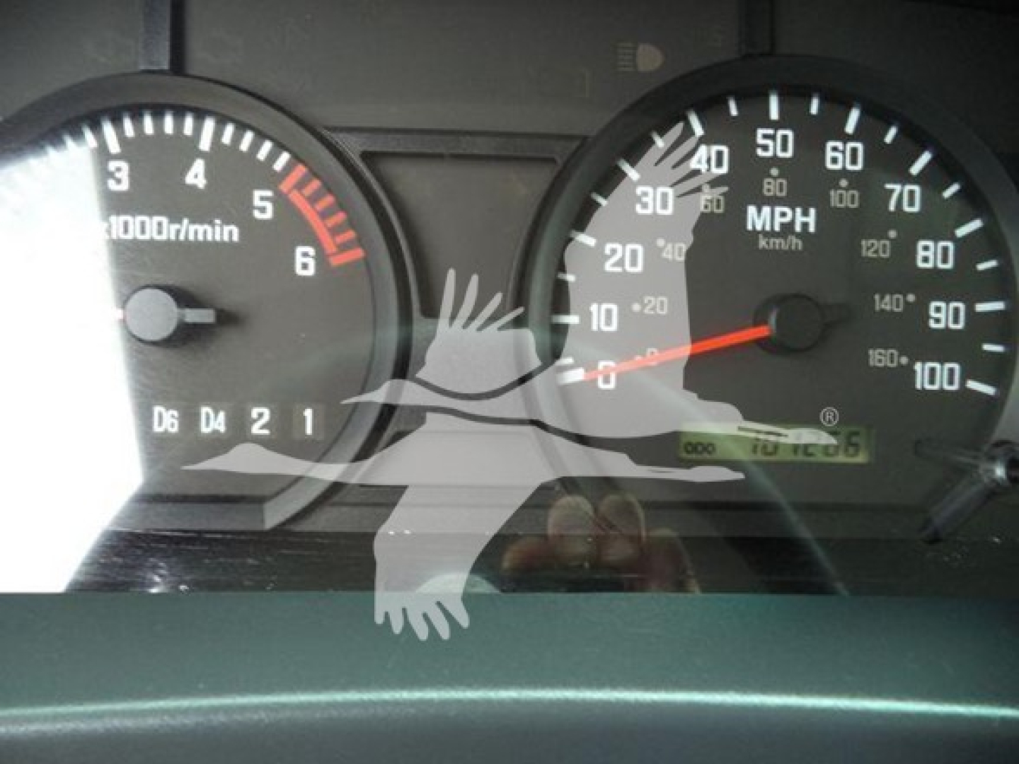Speedometer and tachometer gauges from a 2017 Chevrolet W4500 dashboard showing RPM and MPH readings.