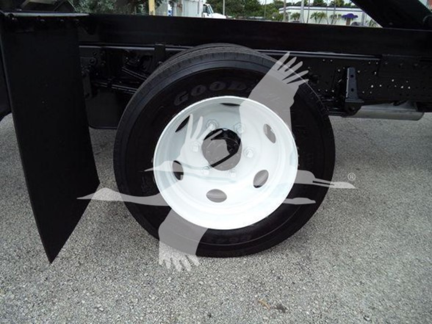 Chevrolet W4500 chassis showing front wheel and suspension with Goodyear tire.