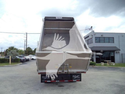 Truck dump bed viewed from rear showing open-top container on a white cab, Chevrolet W4500 dump truck