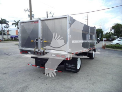Dump truck bed of a 2017 Chevrolet W4500 rear view showing dual rear doors and reflective decals.