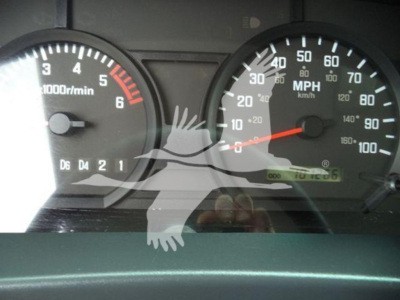 Speedometer and tachometer gauges from a 2017 Chevrolet W4500 dashboard showing RPM and MPH readings.