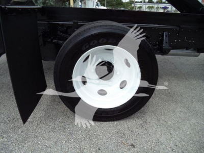 Chevrolet W4500 chassis showing front wheel and suspension with Goodyear tire.