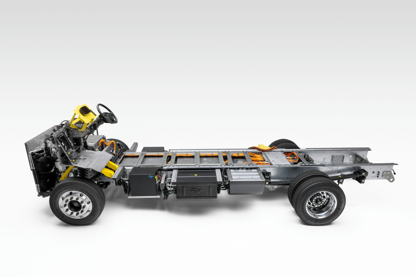 Harbinger S534 chassis with exposed frame and cab area, showing intermediate drivetrain components and empty cargo area.