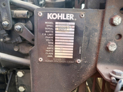 Kohler engine data plate on a diesel generator or industrial engine with model and serial numbers visible.