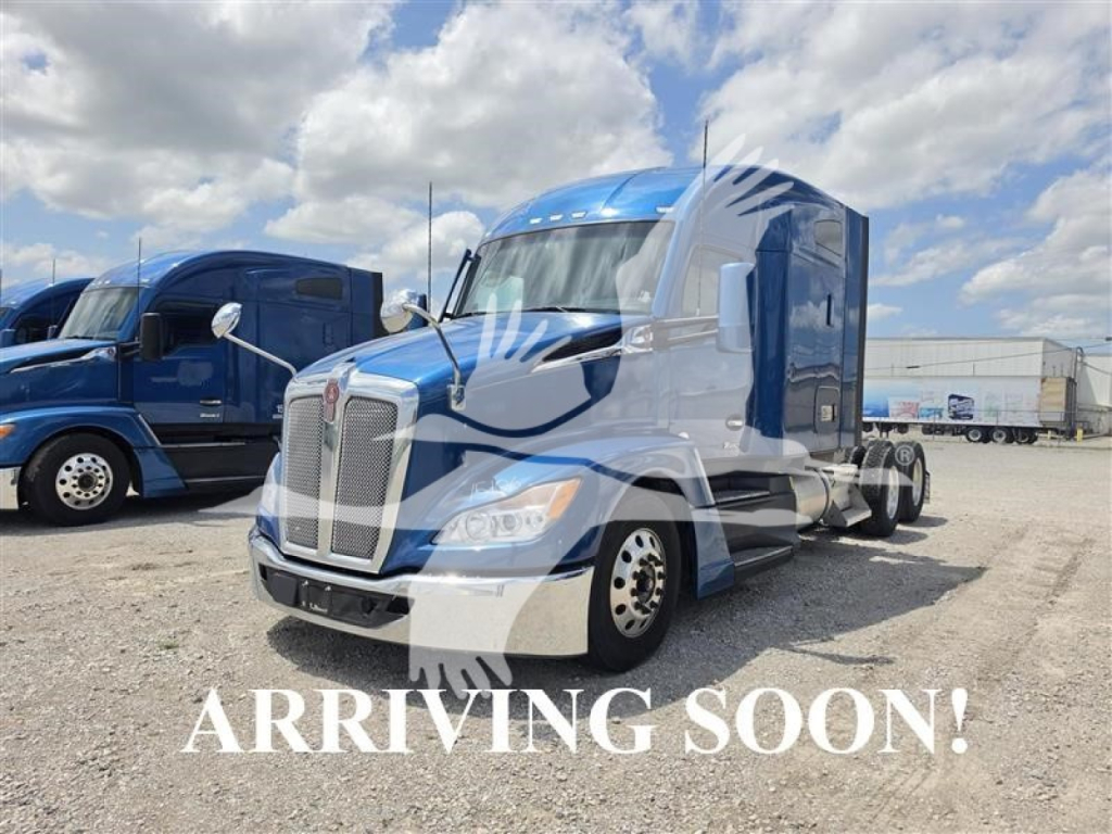 Kenworth T680 conventional sleeper truck in blue and white, front three-quarter view, with 'Arriving Soon!' overlay.