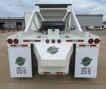 Rear view of Armor Lite SBD40 air dump trailer showing dual fenders with Armor Lite logos, taillights, and frame structure.