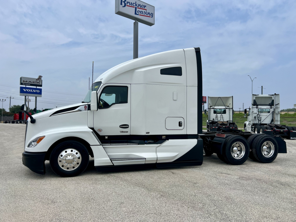 Kenworth T680 conventional sleeper tractor in side view showing cab details and chassis.