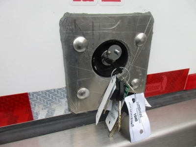  Freightliner M2 106 Plus cab area showing lock cylinder with keys and tags.