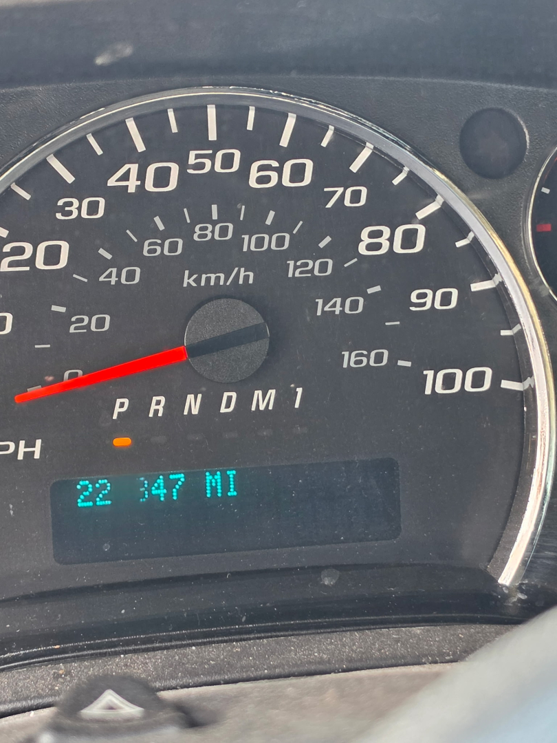 Speedometer of 2016 Chevrolet Express 3500 showing 0-100 mph scale, gear indicator PRNDM1, and odometer reading 22 347 MI on digital display.