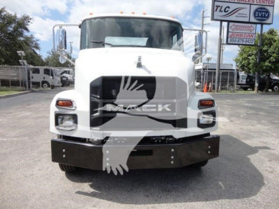 Front view of a white 2026 Mack MD6 rollback truck showing grille, bumper, and headlights.