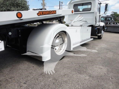 MD6 Mack rollback truck rear fender and wheel shown with white body and Jerr-Dan equipment, stock number J04370 visible.