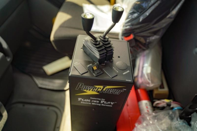 Freightliner 114SD interior view showing PowerTower control with two joysticks and shifter.