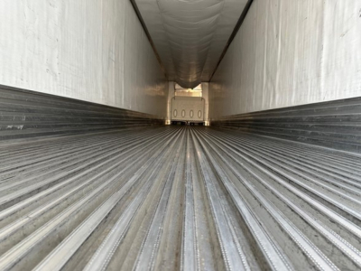 Trailer interior showing long straight dry van space with ribbed floor