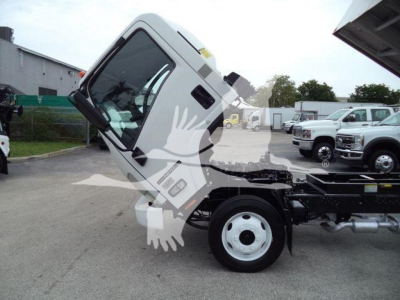 Isuzu NPR-HD cab and chassis showing side view with tilted cab, front wheel, and exposed chassis frame.