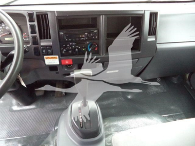 Isuzu NPR-HD dashboard and center console with automatic gear shifter visible.