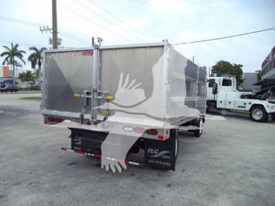 Isuzu NPR-HD dump truck rear view showing tailgate and TLC logo on mudflaps