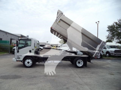 Isuzu NPR-HD dump truck in service position with bed raised, side view showing cab and front wheels