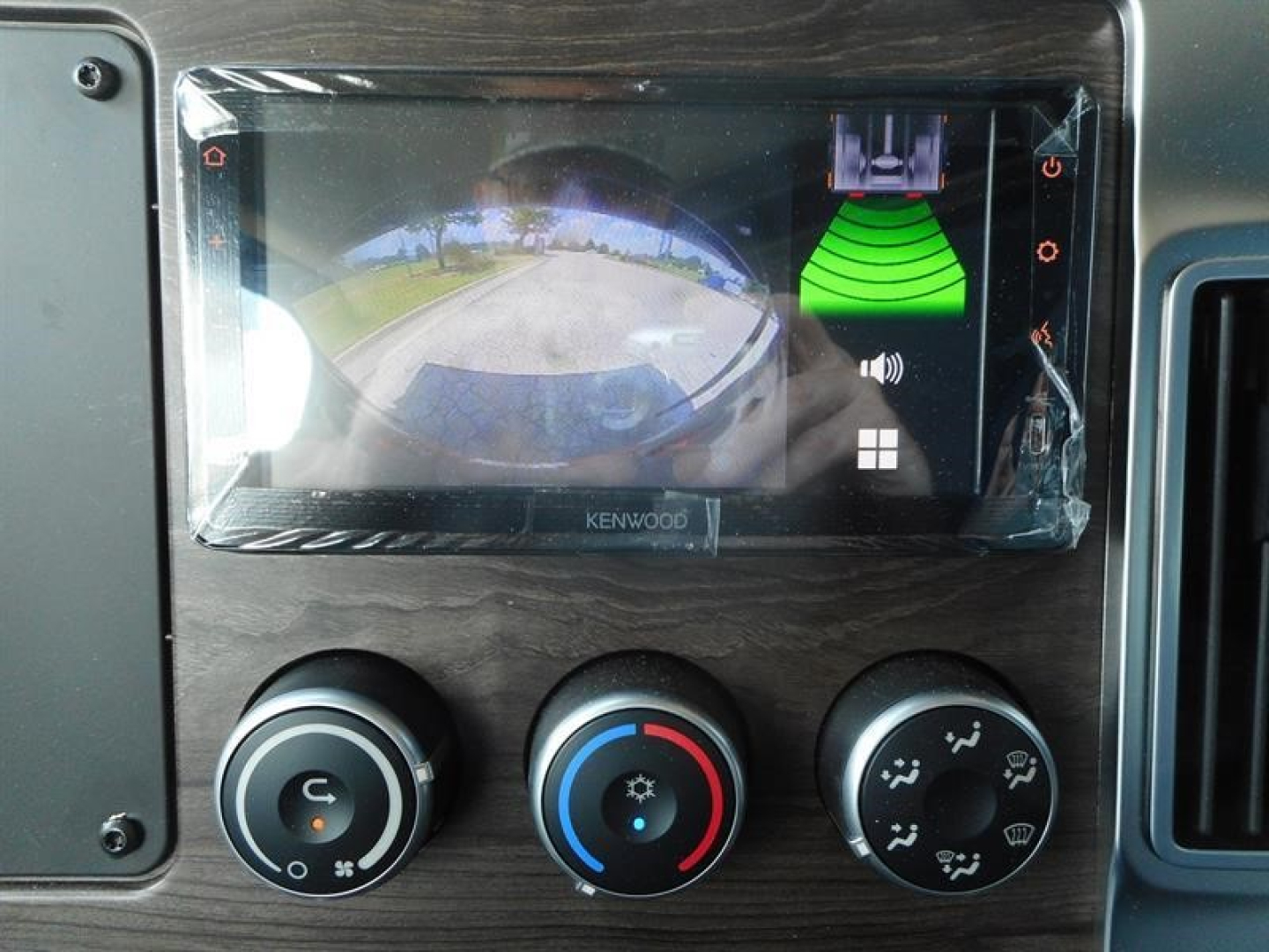 Western Star 47X dash area showing Kenwood touchscreen display and climate controls.