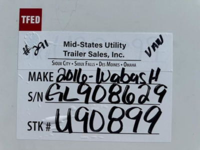 Van trailer information tag showing TFED sticker and handwritten stock number U90899, VIN 1JJV532D5GL908629, make 2016 Wabash, S/N G L 908629, stock U90899